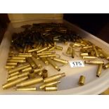 Tray of approximately 100 brass rifle bullet cases