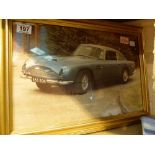 Two framed prints of Aston Martin DB5 and Regal 5455 Bom