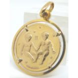 14ct gold Gemini medallion in 14ct gold mount,