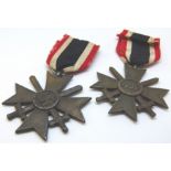 Two German WWII Merit Crosses with ribbons