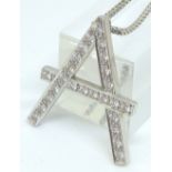 Platinum letter A pendant set with approximately 1ct diamonds on platinum chain,