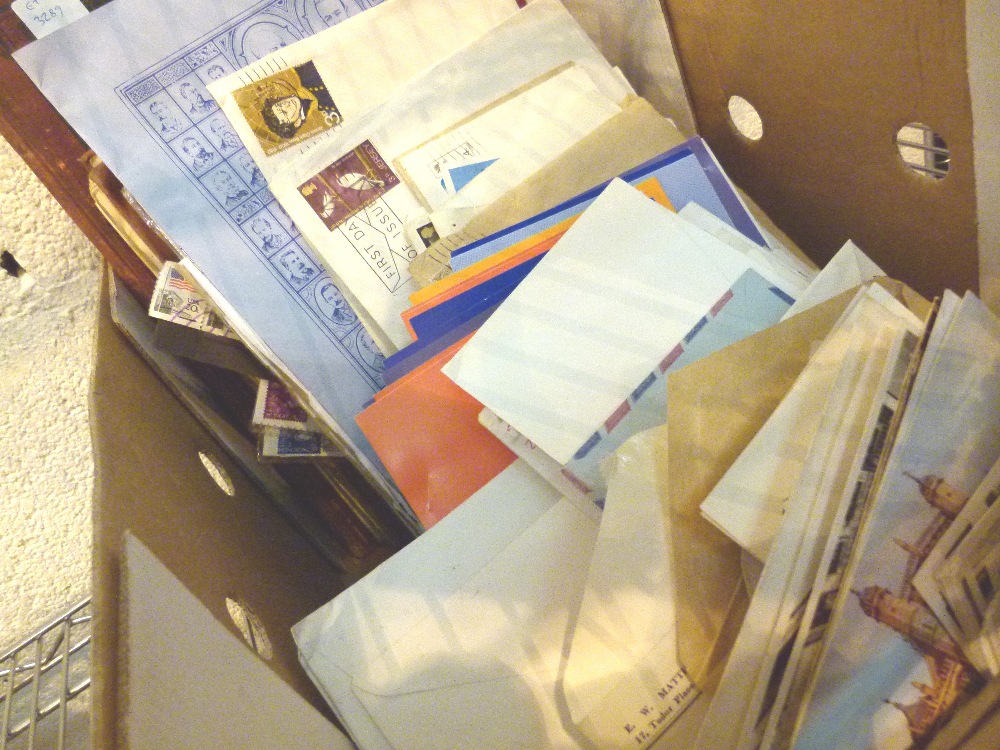 Quantity of mixed world stamps and albums