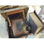 Vintage plate camera with some unopened glass plates,