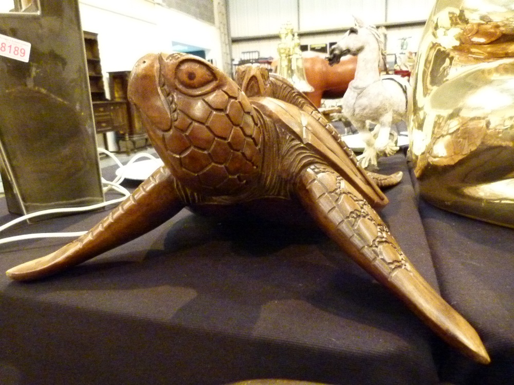 Wooden carved turtle with turtle on back,