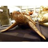 Wooden carved turtle with turtle on back,