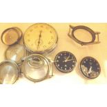 Collection of military wristwatch dials and movements and a military stopwatch