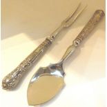 Pair of silver handled serving items,