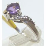 Sterling silver and 9ct gold amethyst solitaire ring,