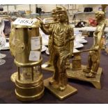 Four brass miners figurines and a davy lamp