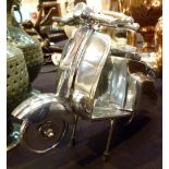 Chrome Vespa scooter model,