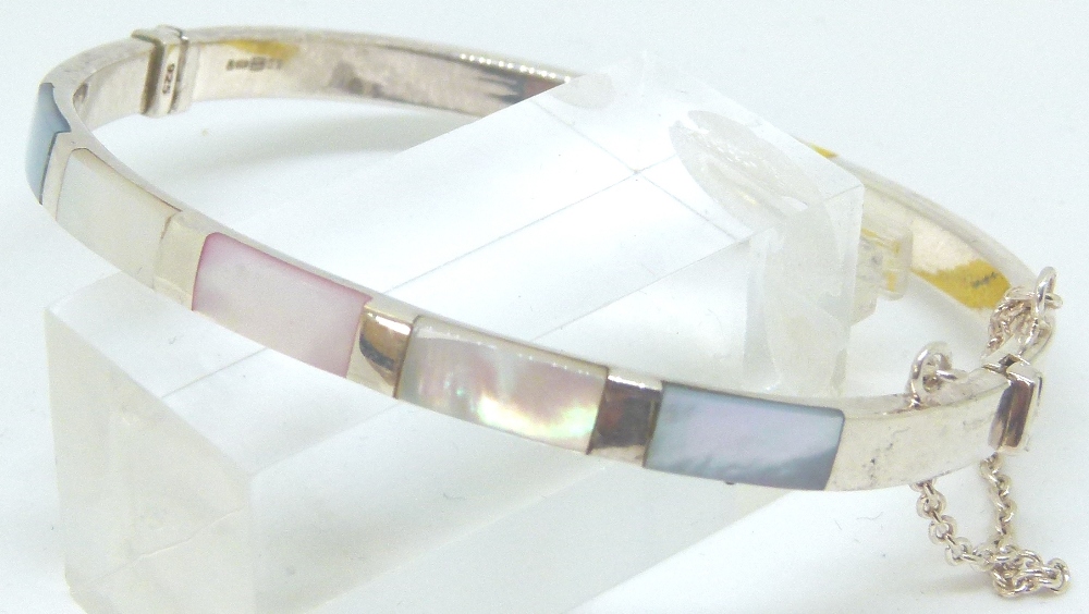 Sterling silver mother of pearl set hinged bangle with safety chain