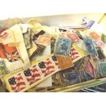 Box of mixed worldwide postage stamps and albums