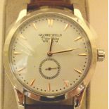 New boxed Globenfeld Discretion white faced with gold coloured numerals,