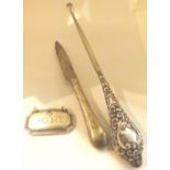 Silver handled button hook white metal knife and a Walker & Hall white metal RAF port label