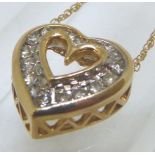 14ct gold diamond set heart pendant on 14ct gold chain, approximately 0.