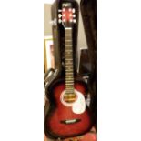 A Johnny Brook acoustic guitar signed by Phil Collins,Tony Banks and Mike Rutherford of Genesis,