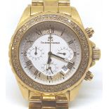 American Techno Mania gents gold plated wristwatch set with three bands of diamonds (cost £800 in