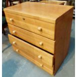 Four drawer pine chest of drawers and a bedside cabinet