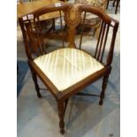 Antique mahogany corner chair with figural inlay