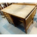 Unusual five drawer desk with folding top