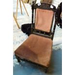 Upholstered ebonised nursing chair