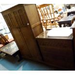 1950s oak bedroom suite consisting of wardrobe and drawers with carved detail