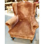 Small wingback upholstered armchair