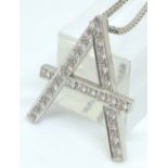 Platinum letter A pendant set with appro