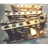 Three gate pipe racks and six pipes incl