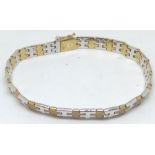 9ct gold bracelet in white and yellow gold, 15g,