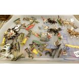 Tray of metal soldiers and indians