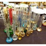 Forty glass bud vases with bubble bases,