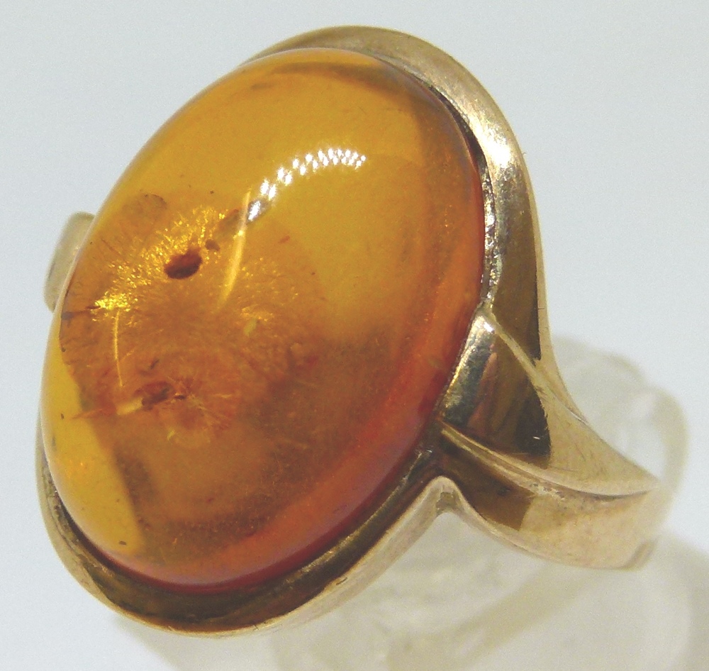 9ct gold cabochon amber ring,