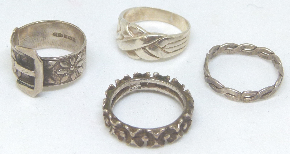 Four sterling silver rings