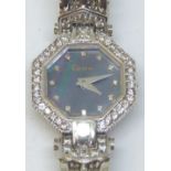14ct white gold Geneve wristwatch with diamond bezel,