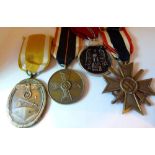 WWII group of four German medals, War Merit Cross 2nd class, Eastern Front medal,