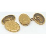 Pair of gold cufflinks monogrammed