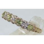 9ct gold peridot and diamond half eternity ring,