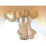 Six silver serving spoons