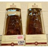 Pair of collectable boxed Bells whisky Millennium 2000 bottles, 70cl,