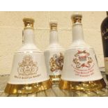 Three ceramic Bells whisky decanters 1981,