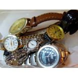 Seven assorted quartz watches,