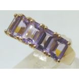 9ct gold emerald cut amethyst five stone ring,