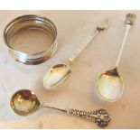 Three silver spoons and a napkin ring,