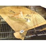 Oriental bamboo fan with tiger painting to one side