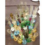 Forty three bud vases in mixed colours with bubble bases