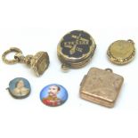 Yellow metal victorian lockets,