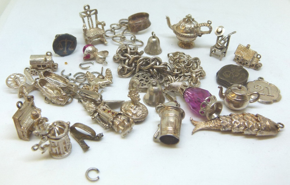 Box of presumed silver charms,