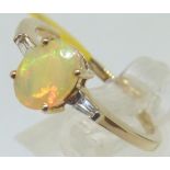 New old stock 9ct opal and white sapphire ring with certificate,