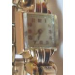 Yellow metal ladies wristwatch